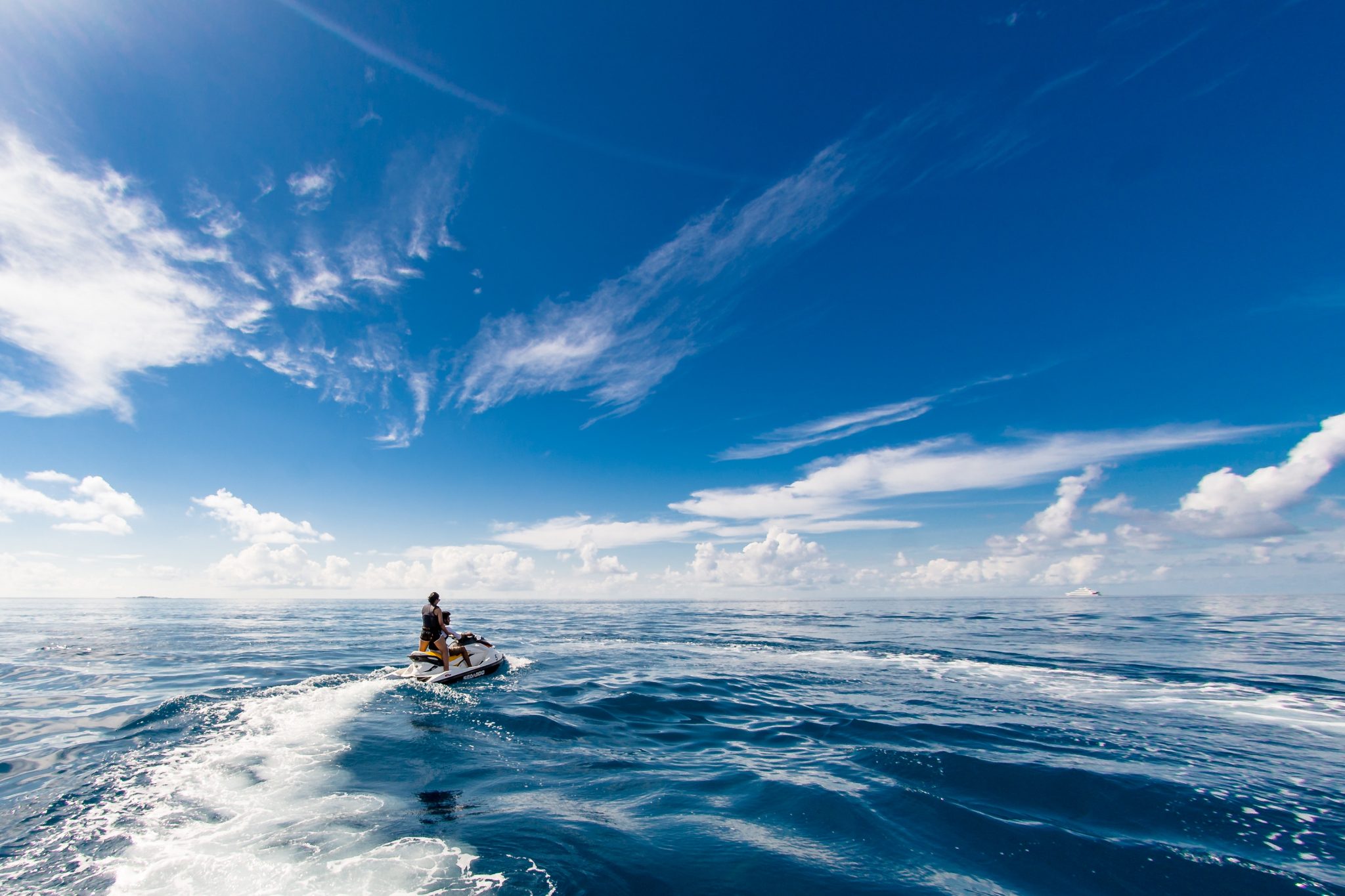 people-riding-a-jet-ski-1430675-2048x1365